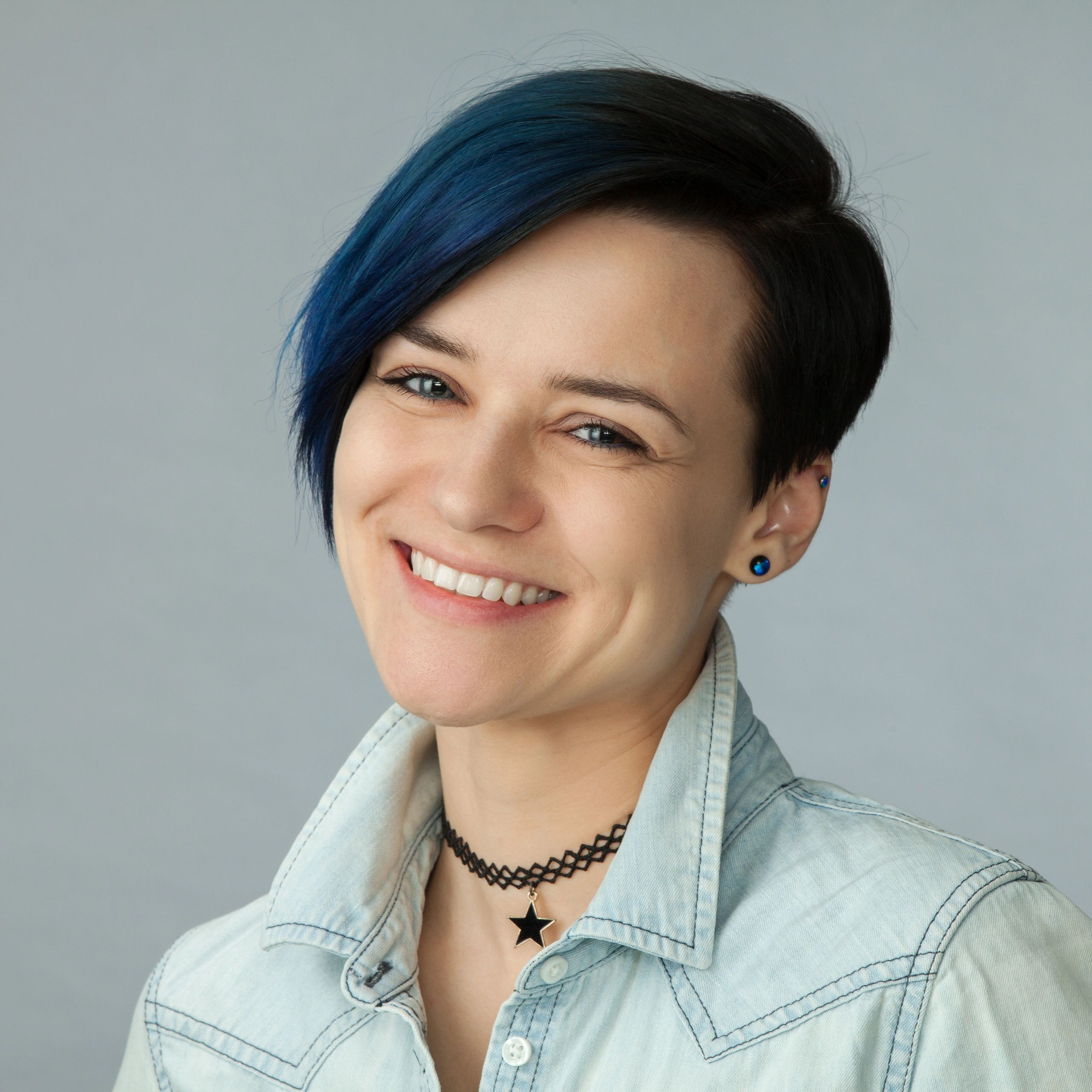 Portrait headshot of a smiling person