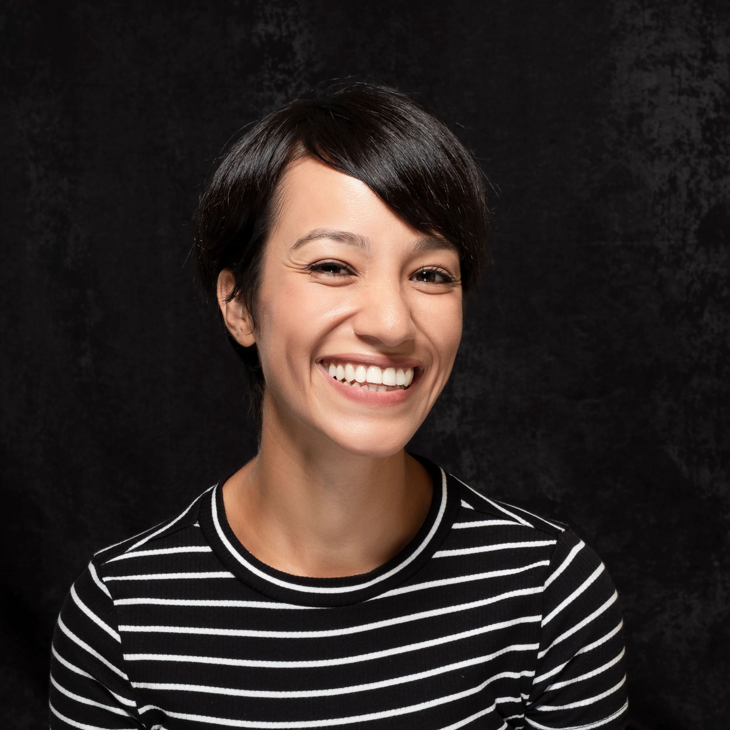 Portrait headshot of a smiling person